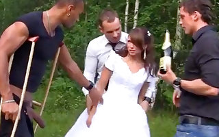 Russian bride enjoys an interracial gang-bang outdoors